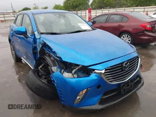 2016 Mazda CX-3 Grand Touring with VIN JM1DKBD70G0124374, listed as a IAAI auction lot 41881577 with 21,378 mi miles. Bid and sale history available at carsss.com. Image 1.