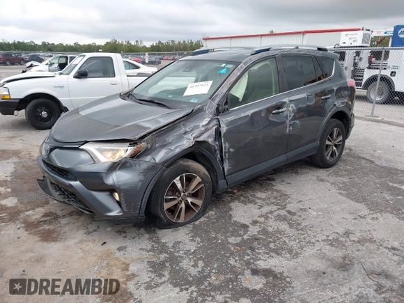 2017 Toyota RAV4 XLE with VIN JTMWFREVXHD096998, listed as a IAAI auction lot 41997925 with 119,564 mi miles and . Bid and sale history available at DreamBid. Image 17.