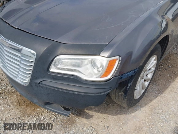 2013 Chrysler 300 with VIN 2C3CCAAG4DH588190, listed as a IAAI auction lot 42476895 with 224,837 mi miles and . Bid and sale history available at DreamBid. Image 6.