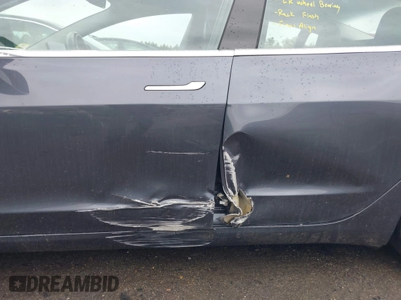2019 Tesla Model 3 Mid Range with VIN 5YJ3E1EA3KF307415, listed as a IAAI auction lot 41673239 with 42,895 mi miles and . Bid and sale history available at DreamBid. Image 6.