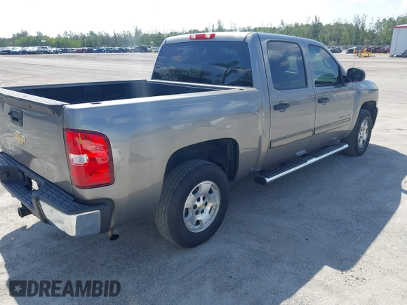 2013 Chevrolet Silverado 1500 LT with VIN 3GCPCSE01DG206827, listed as a IAAI auction lot 41976945 with 213,940 mi miles and . Bid and sale history available at DreamBid. Image 4.