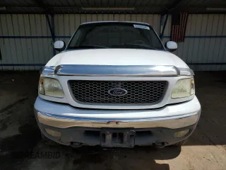 2001 Ford F-150 XLT with VIN 1FTRW08L41KB76026, listed as a Copart auction lot 63526545 with 174,126 mi miles and Clean title. Bid and sale history available at DreamBid. Image 5.