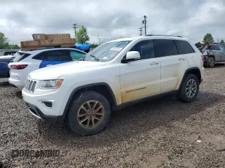 2014 Jeep Grand Cherokee Limited z VIN 1C4RJFBG7EC497555, wystawiony jako Copart lot #59763765 z przebiegiem 95 644 mil mil oraz Szkoda całkowita • Salvage title. Historia ofert i sprzedaży dostępna na DreamBid. Obrazek 1.