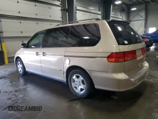 2000 Honda Odyssey EX with VIN 2HKRL1875YH611548, listed as a Copart auction lot 56593275 with 191,533 mi miles and Salvage title. Bid and sale history available at DreamBid. Image 2.