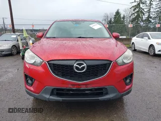 2015 Mazda CX-5 Grand Touring with VIN JM3KE4DY0F0479392, listed as a IAAI auction lot 41659415 with 141,403 mi miles. Bid and sale history available at carsss.com. Image 12.