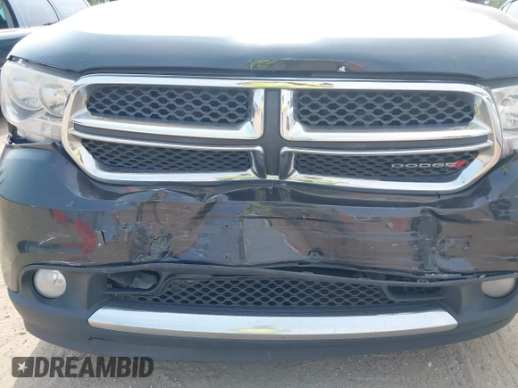 2013 Dodge Durango Crew z VIN 1C4RDJDG3DC685995, wystawiony jako IAAI lot #42490067 z przebiegiem 205 806 mil mil oraz . Historia ofert i sprzedaży dostępna na DreamBid. Obrazek 6.