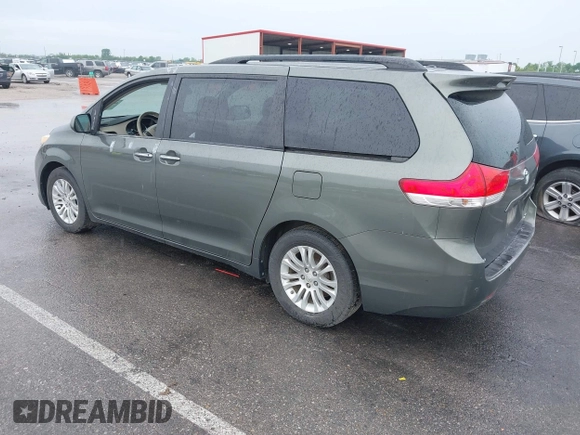 2011 Toyota Sienna XLE AAS with VIN 5TDYK3DC7BS041020, listed as a IAAI auction lot 42218328 with Not Provided miles and . Bid and sale history available at DreamBid. Image 3.