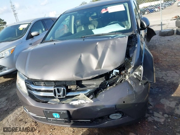 2015 Honda Odyssey Touring Elite with VIN 5FNRL5H90FB097984, listed as a IAAI auction lot 41822726 with 107,322 mi miles. Bid and sale history available at carsss.com. Image 12.
