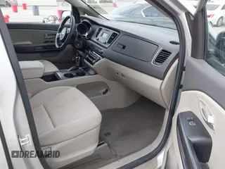 2015 Kia Sedona L with VIN KNDMA5C16F6027418, listed as a IAAI auction lot 42129259 with 78,097 mi miles. Bid and sale history available at carsss.com. Image 5.