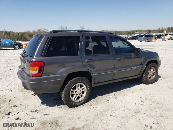 2003 Jeep Grand Cherokee Laredo with VIN 1J4GW48SX3C589100, listed as a Copart auction lot 49986745 with 247,687 mi miles and Salvage Title. Bid and sale history available at carsss.com. Image 3.
