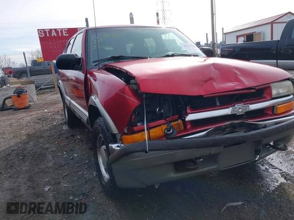 2000 Chevrolet Blazer LT z VIN 1GNDT13W2Y2163805, wystawiony jako IAAI lot #41537780 z przebiegiem 170 527 mil mil oraz . Historia ofert i sprzedaży dostępna na DreamBid. Obrazek 1.