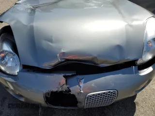2007 Pontiac Solstice z VIN 1G2MB35B77Y113046, wystawiony jako Copart lot #52297605 z przebiegiem 35 658 mil mil oraz Szkoda całkowita • Salvage title. Historia ofert i sprzedaży dostępna na DreamBid. Obrazek 13.