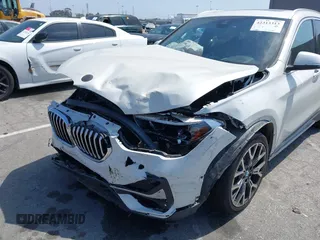 2020 BMW X1 xDrive28i with VIN WBXJG9C04L5R18165, listed as a IAAI auction lot 42313313 with 46,815 mi miles and . Bid and sale history available at DreamBid. Image 6.