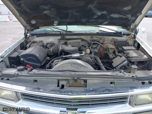 1997 Chevrolet Tahoe with VIN 1GNEK13R6VJ443195, listed as a IAAI auction lot 42000733 with 202,106 mi miles. Bid and sale history available at carsss.com. Image 10.
