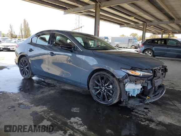 2024 Mazda 3 S Carbon Edition with VIN 3MZBPBCM7RM410798, listed as a Copart auction lot 52444015 with 17,150 mi miles and Non Repairable. Bid and sale history available at DreamBid. Image 4.