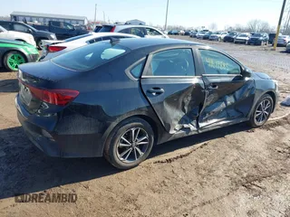 2024 Kia Forte LX with VIN 3KPF24AD5RE826859, listed as a IAAI auction lot 41619885 with 5,007 mi miles. Bid and sale history available at carsss.com. Image 4.