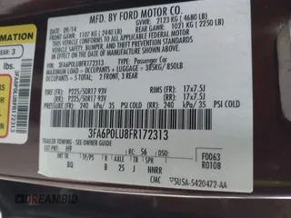2015 Ford Fusion SE Hybrid with VIN 3FA6P0LU8FR172313, listed as a IAAI auction lot 41556556 with 152,567 mi miles. Bid and sale history available at carsss.com. Image 9.