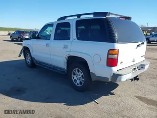 2003 Chevrolet Tahoe Z71 with VIN 1GNEK13T73R225437, listed as a IAAI auction lot 41679198 with 199,048 mi miles. Bid and sale history available at carsss.com. Image 3.