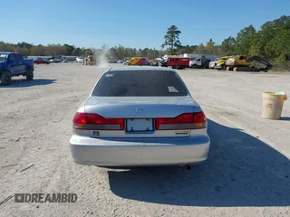 2002 Honda Accord SE z VIN 1HGCG66852A067989, wystawiony jako IAAI lot #41868854 z przebiegiem 177 905 mil mil oraz . Historia ofert i sprzedaży dostępna na DreamBid. Obrazek 16.