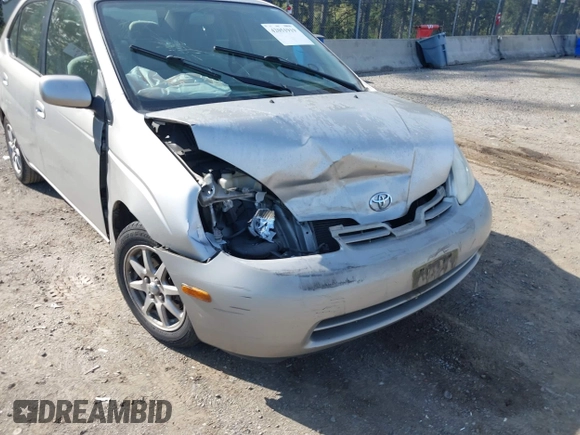 2003 Toyota Prius z VIN JT2BK18U330074266, wystawiony jako IAAI lot #42051919 z przebiegiem 214 567 mil mil oraz . Historia ofert i sprzedaży dostępna na DreamBid. Obrazek 6.