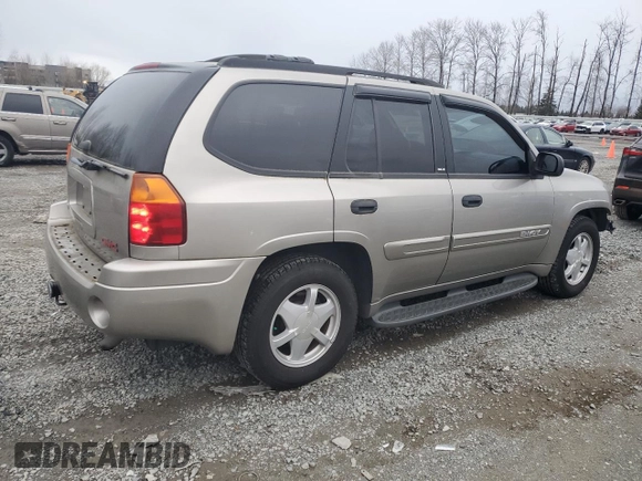 2002 GMC Envoy SLT with VIN 1GKDT13S522425155, listed as a Copart auction lot 48575895 with 52,307 mi miles and Salvage Title. Bid and sale history available at carsss.com. Image 3.