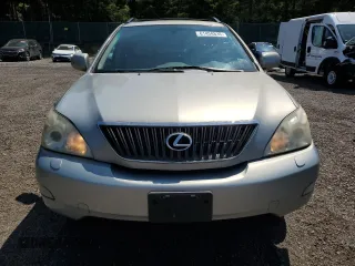 2006 Lexus RX 330 z VIN 2T2HA31UX6C093543, wystawiony jako Copart lot #61458835 z przebiegiem 157 653 mil mil oraz Szkoda całkowita • Salvage title. Historia ofert i sprzedaży dostępna na DreamBid. Obrazek 5.