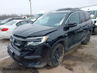 2021 Honda Pilot Special Edition with VIN 5FNYF6H2XMB040099, listed as a IAAI auction lot 41619649 with 70,567 mi miles. Bid and sale history available at carsss.com. Image 2.