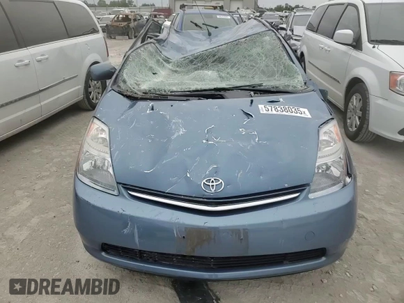 2007 Toyota Prius z VIN JTDKB20U977690141, wystawiony jako Copart lot #57838035 z przebiegiem Nie podano mil oraz Szkoda całkowita • Salvage title. Historia ofert i sprzedaży dostępna na DreamBid. Obrazek 13.