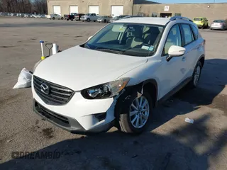 2016 Mazda CX-5 Sport with VIN JM3KE4BY8G0605504, listed as a IAAI auction lot 41866173 with 91,797 mi miles. Bid and sale history available at carsss.com. Image 18.