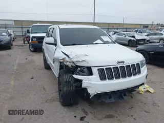 2015 Jeep Grand Cherokee Altitude with VIN 1C4RJEAG2FC901391, listed as a IAAI auction lot 41565763 with 220,685 mi miles. Bid and sale history available at carsss.com. Image 1.