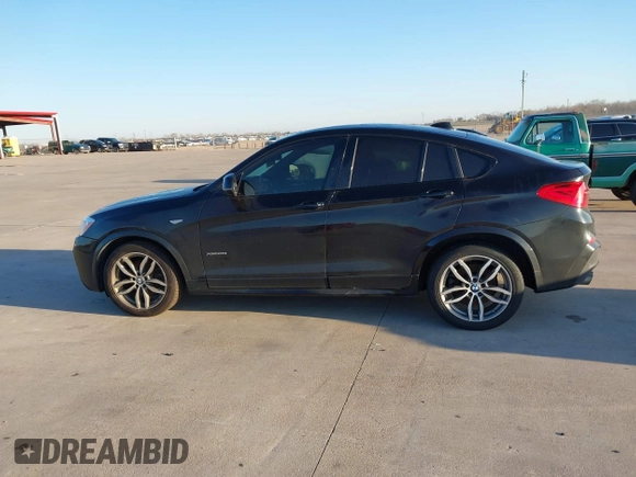 2018 BMW X4 xDrive28i with VIN 5UXXW3C59J0T80560, listed as a IAAI auction lot 41734915 with 122,850 mi miles. Bid and sale history available at carsss.com. Image 14.