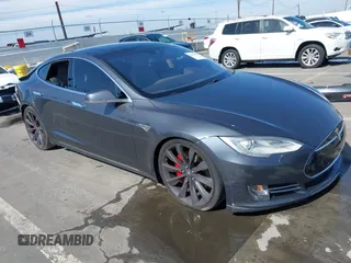 2015 Tesla Model S 85D with VIN 5YJSA1E41FF110217, listed as a IAAI auction lot 41594198 with 93,746 mi miles. Bid and sale history available at carsss.com. Image 1.