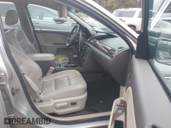 2008 Ford Taurus SEL with VIN 1FAHP24W78G105183, listed as a IAAI auction lot 41441086 with 215,758 mi miles. Bid and sale history available at carsss.com. Image 5.
