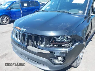 2014 Jeep Compass Limited with VIN 1C4NJDCBXED706173, listed as a IAAI auction lot 41784040 with 144,368 mi miles. Bid and sale history available at carsss.com. Image 6.