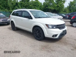 2014 Dodge Journey SXT z VIN 3C4PDCBBXET135001, wystawiony jako IAAI lot #42318360 z przebiegiem 152 321 mil mil oraz . Historia ofert i sprzedaży dostępna na DreamBid. Obrazek 1.