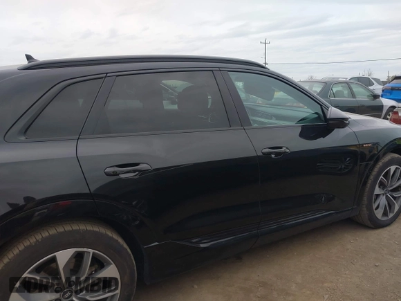 2021 Audi e-tron Premium Plus with VIN WA1LAAGEXMB019208, listed as a IAAI auction lot 41725933 with 51,565 mi miles and . Bid and sale history available at DreamBid. Image 13.