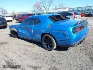 2015 Dodge Challenger R/T with VIN 2C3CDZAT8FH924371, listed as a IAAI auction lot 41870700 with 105,419 mi miles. Bid and sale history available at carsss.com. Image 3.