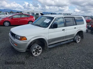 1998 Mitsubishi Montero Sport LS with VIN JA4MT31P3WP025054, listed as a IAAI auction lot 41880704 with 381,966 mi miles. Bid and sale history available at carsss.com. Image 2.