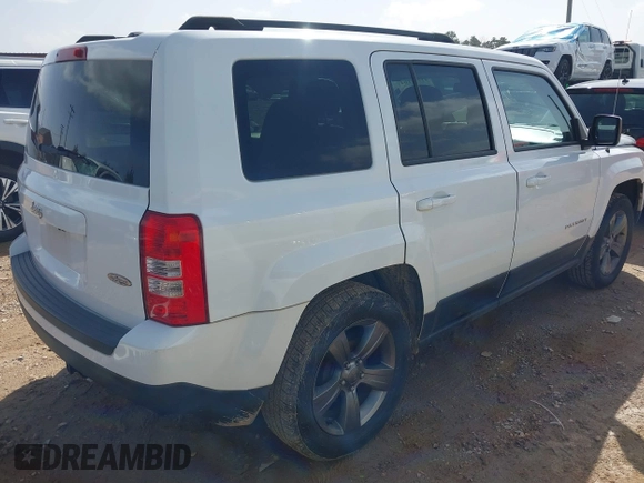 2014 Jeep Patriot High Altitude with VIN 1C4NJPFA6ED663066, listed as a IAAI auction lot 41709104 with 115,988 mi miles and . Bid and sale history available at carsss.com. Image 4.