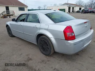 2009 Chrysler 300 Touring with VIN 2C3KA53V69H500462, listed as a IAAI auction lot 41896177 with 213,761 mi miles. Bid and sale history available at carsss.com. Image 3.
