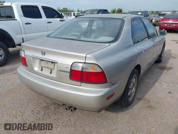 1996 Honda Accord Value with VIN 1HGCD5690TA212711, listed as a IAAI auction lot 42035289 with 184,592 mi miles and . Bid and sale history available at carsss.com. Image 4.