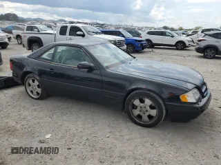 1999 Mercedes-Benz SL-Class with VIN WDBFA68F3XF187095, listed as a Copart auction lot 74514554 with 131,352 mi miles and Salvage Title. Bid and sale history available at carsss.com. Image 4.