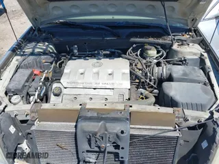 2001 Cadillac DeVille with VIN 1G6KD54Y91U235374, listed as a IAAI auction lot 41874980 with 136,090 mi miles. Bid and sale history available at carsss.com. Image 10.