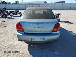 2000 Toyota ECHO with VIN JTDAT1230Y0098418, listed as a Copart auction lot 71919434 with 69,644 mi miles and Clean Title. Bid and sale history available at carsss.com. Image 6.