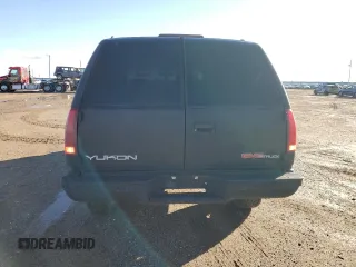 1997 GMC Yukon with VIN 1GKEK13R0VJ710179, listed as a Copart auction lot 81374234 with 186,257 mi miles and Salvage Title. Bid and sale history available at carsss.com. Image 6.
