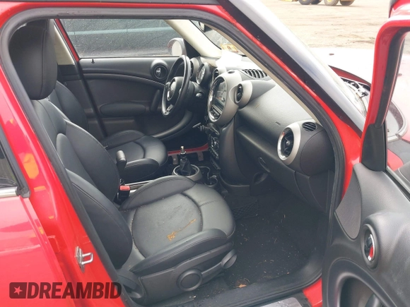 2012 MINI Countryman S z VIN WMWZC3C52CWM26424, wystawiony jako IAAI lot #41828011 z przebiegiem 145 678 mil mil oraz . Historia ofert i sprzedaży dostępna na DreamBid. Obrazek 5.