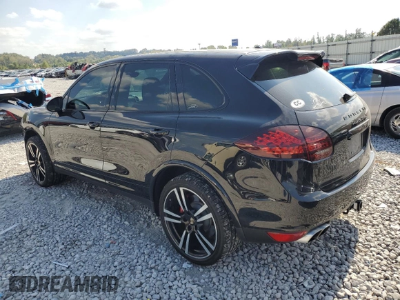2014 Porsche Cayenne Turbo with VIN WP1AC2A2XELA85702, listed as a Copart auction lot 72328394 with 100,142 mi miles and Salvage title. Bid and sale history available at DreamBid. Image 2.