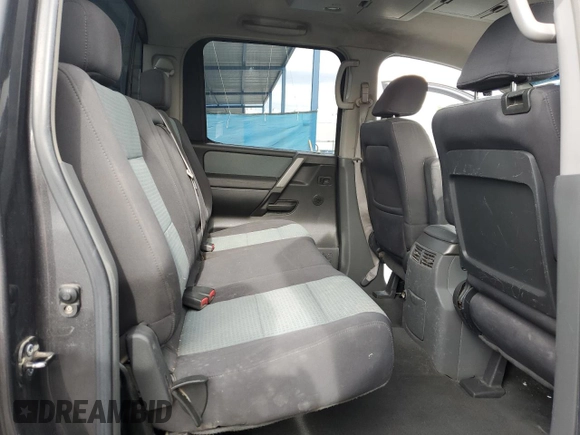 2005 Nissan Titan SE with VIN 1N6AA07B65N566082, listed as a Copart auction lot 80879174 with 215,297 mi miles and Clean Title. Bid and sale history available at carsss.com. Image 10.