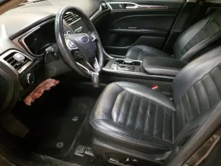 2017 Ford Fusion Hybrid SE z VIN 3FA6P0LU4HR226127, wystawiony jako Copart lot #50496455 z przebiegiem 98 027 mil mil oraz Szkoda całkowita • Salvage title. Historia ofert i sprzedaży dostępna na DreamBid. Obrazek 7.