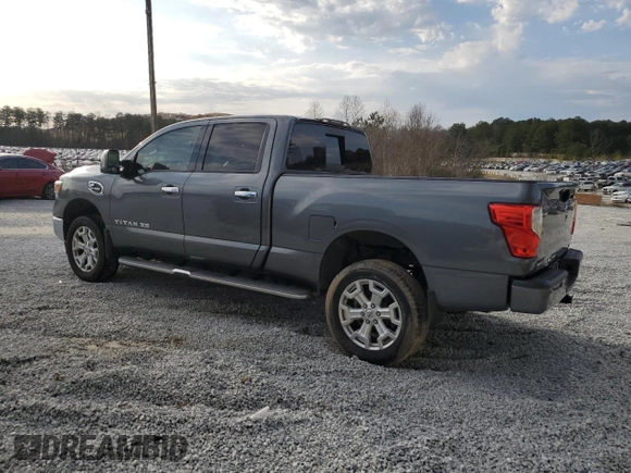 2016 Nissan Titan SL z VIN 1N6BA1F29GN515240, wystawiony jako Copart lot #45185835 z przebiegiem 137 164 mil mil oraz Czysty tytuł • Clean title. Historia ofert i sprzedaży dostępna na DreamBid. Obrazek 2.